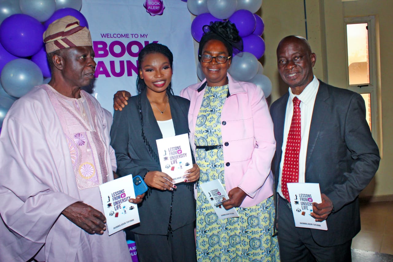 PHOTO NEWS:OLUWATOFUNMI AKINMOLADUN LAUNCHES BOOK, BECOMES FIRST UNDERGRADUATE AUTHOR IN ELIZADE UNIVERSITY HISTORY